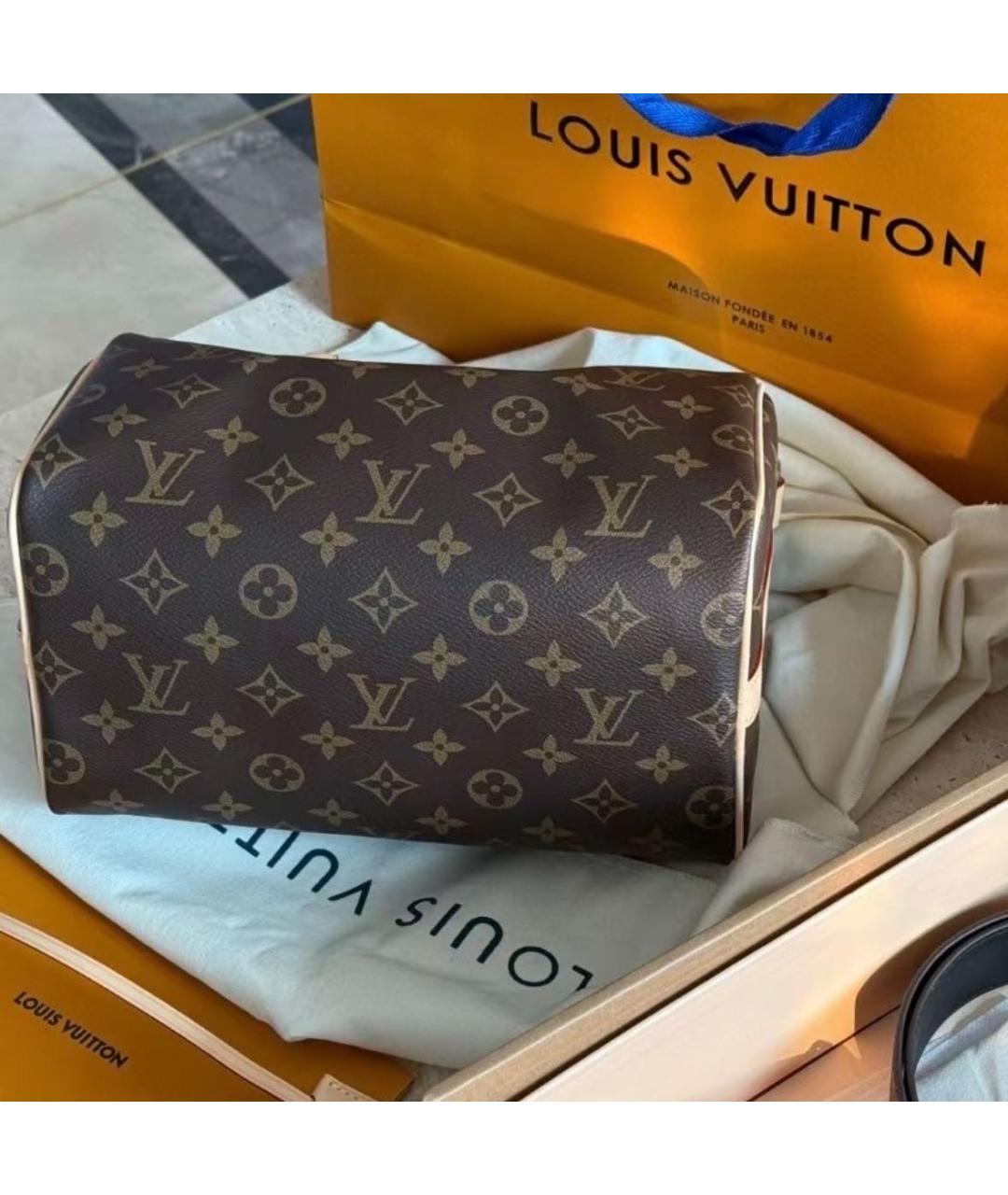 LOUIS VUITTON Коричневая кожаная сумка с короткими ручками, фото 3