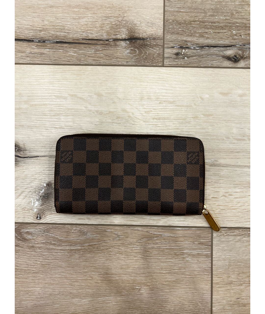 LOUIS VUITTON PRE-OWNED Коричневый кожаный кошелек, фото 9