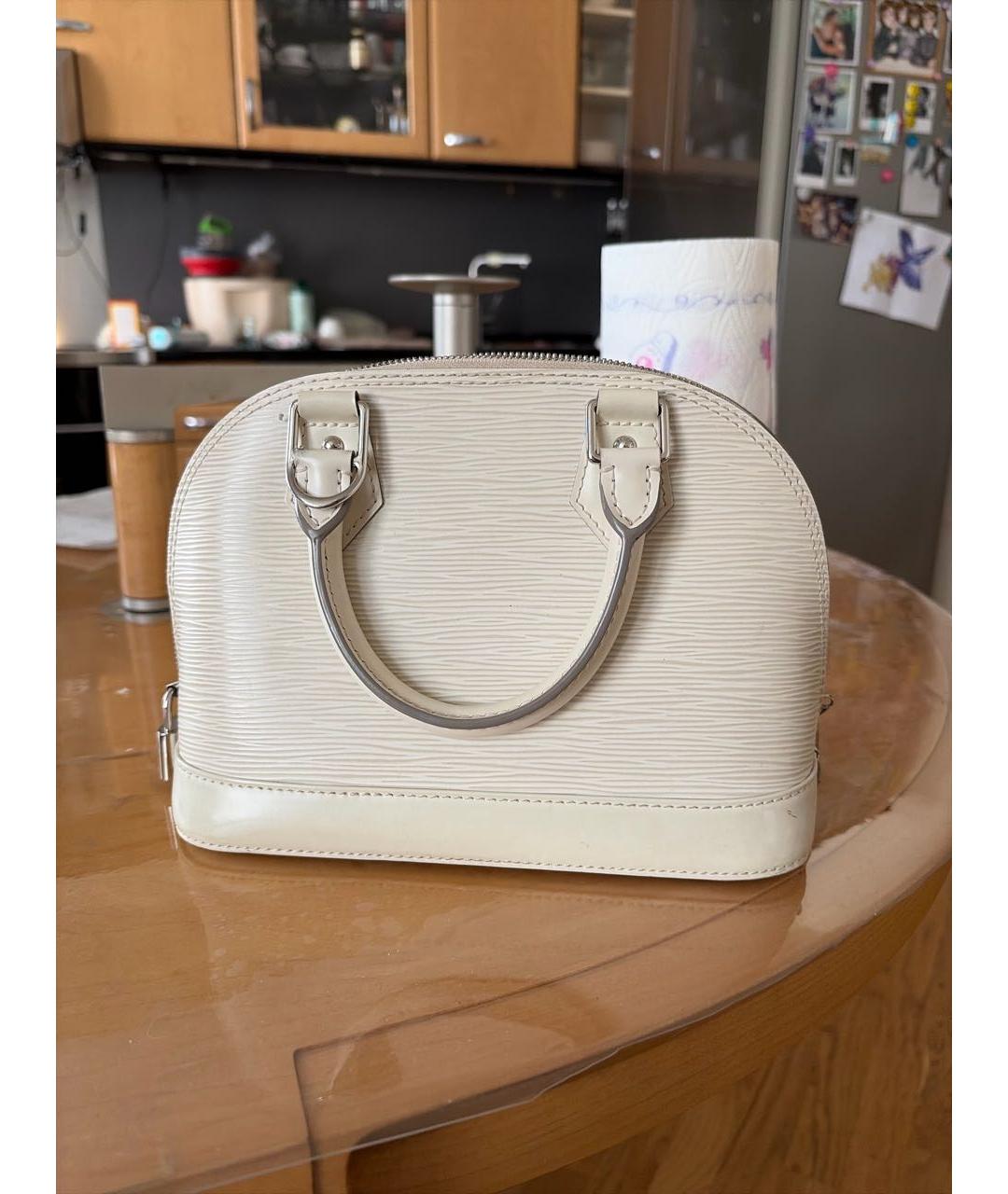 LOUIS VUITTON Бежевая кожаная сумка с короткими ручками, фото 3