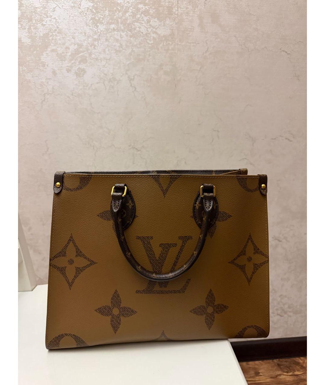 LOUIS VUITTON Коричневая кожаная сумка с короткими ручками, фото 5