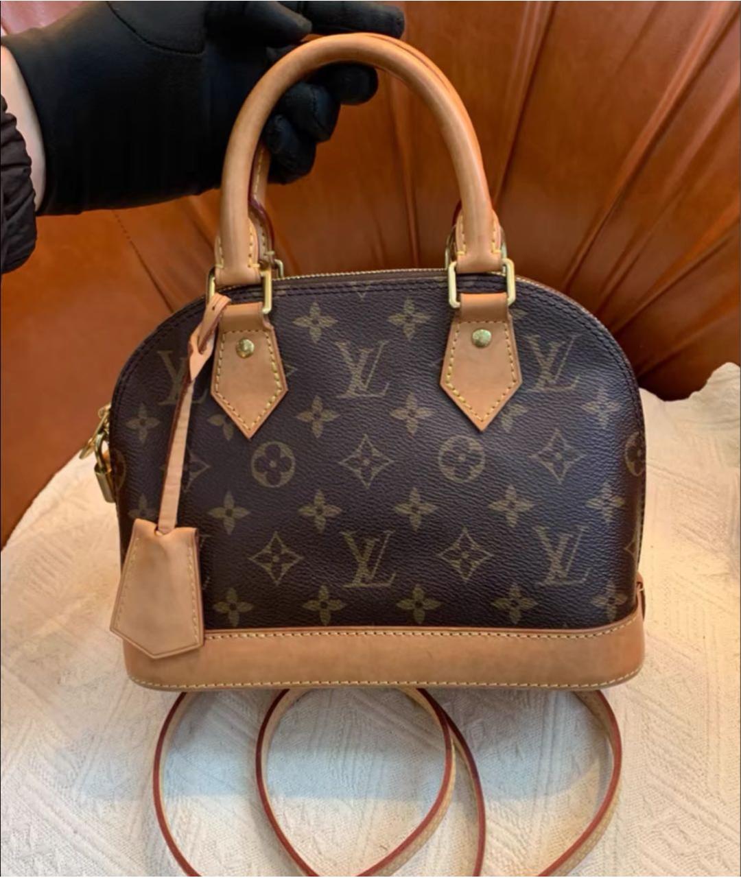 LOUIS VUITTON Коричневая кожаная сумка с короткими ручками, фото 4