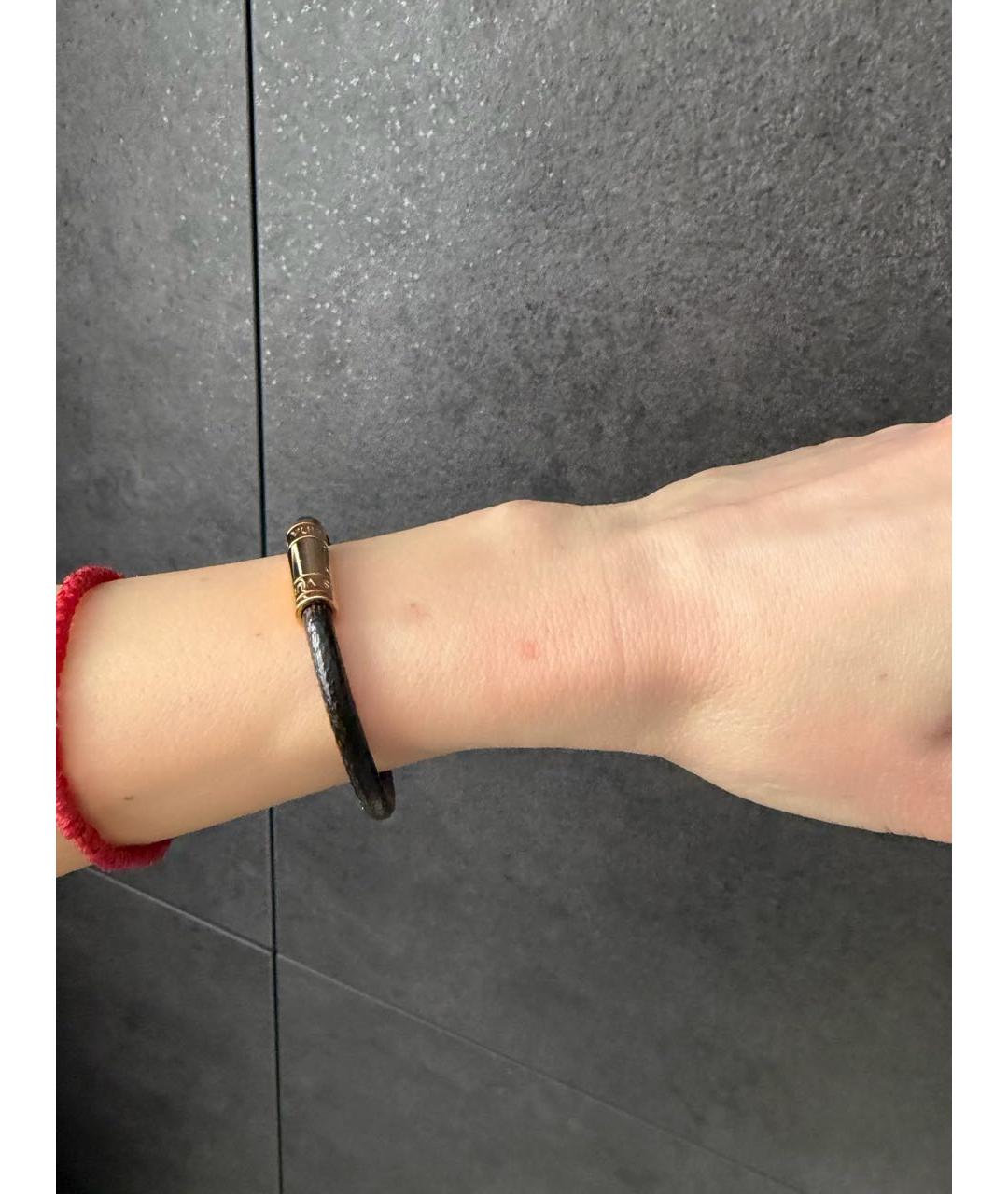 LOUIS VUITTON Коричневый латунный браслет, фото 4