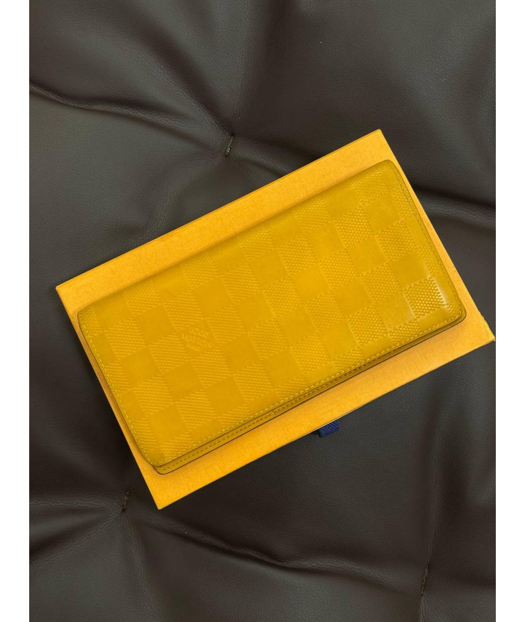 LOUIS VUITTON Оранжевый кожаный кошелек, фото 8