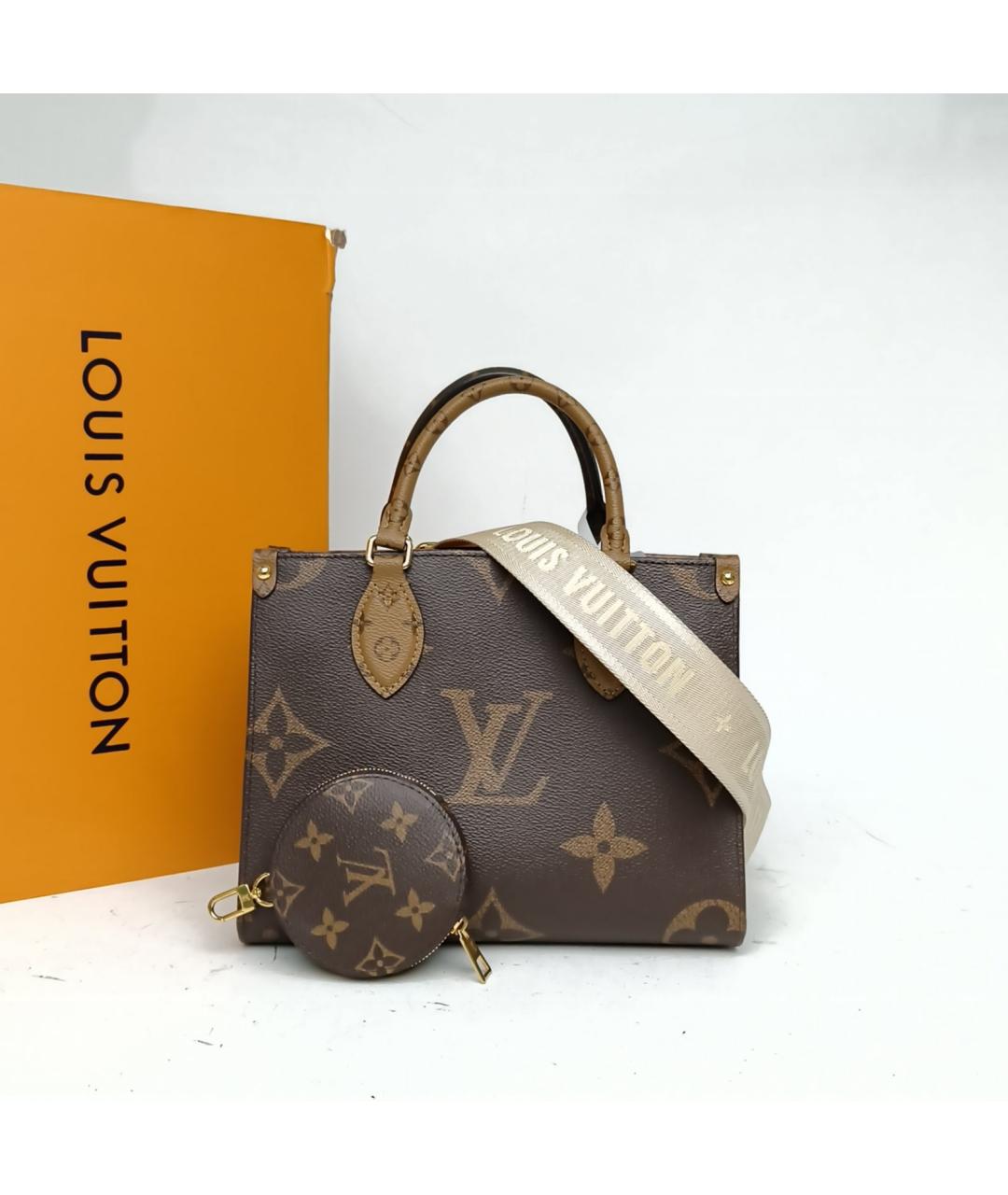 LOUIS VUITTON Коричневая кожаная сумка с короткими ручками, фото 8