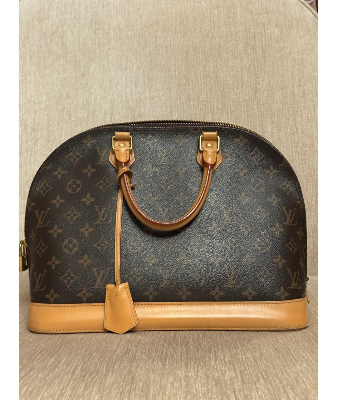 LOUIS VUITTON Коричневая кожаная сумка с короткими ручками, фото 3