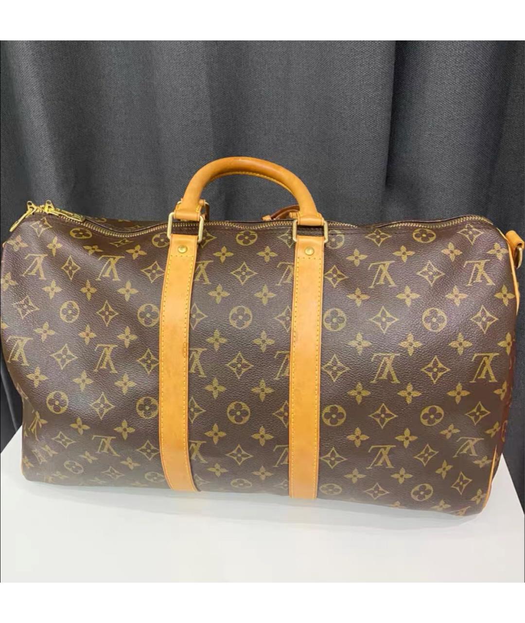 LOUIS VUITTON Коричневая кожаная дорожная/спортивная сумка, фото 2