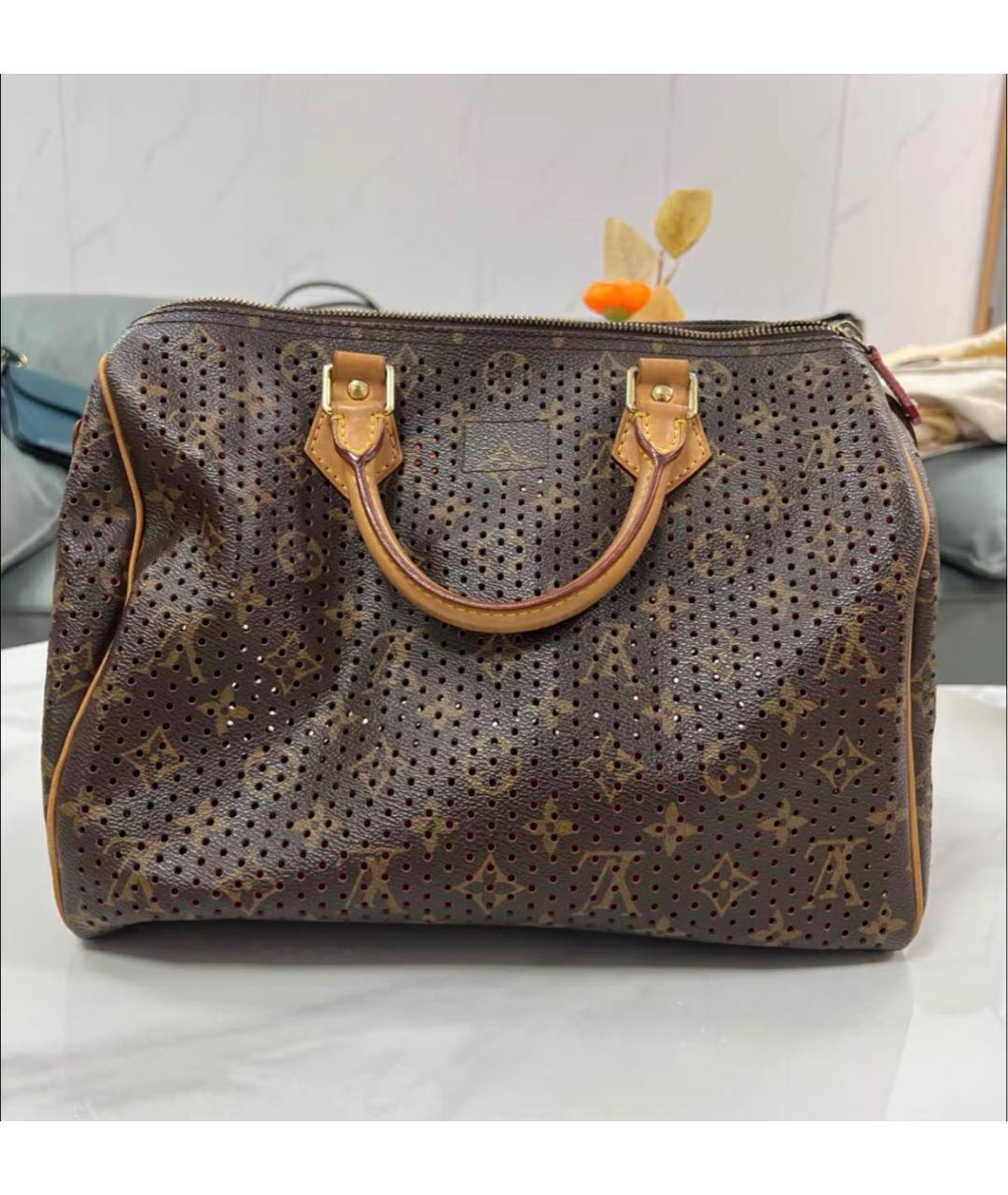 LOUIS VUITTON Кожаная сумка с короткими ручками, фото 3