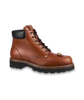 LOUIS VUITTON Высокие ботинки