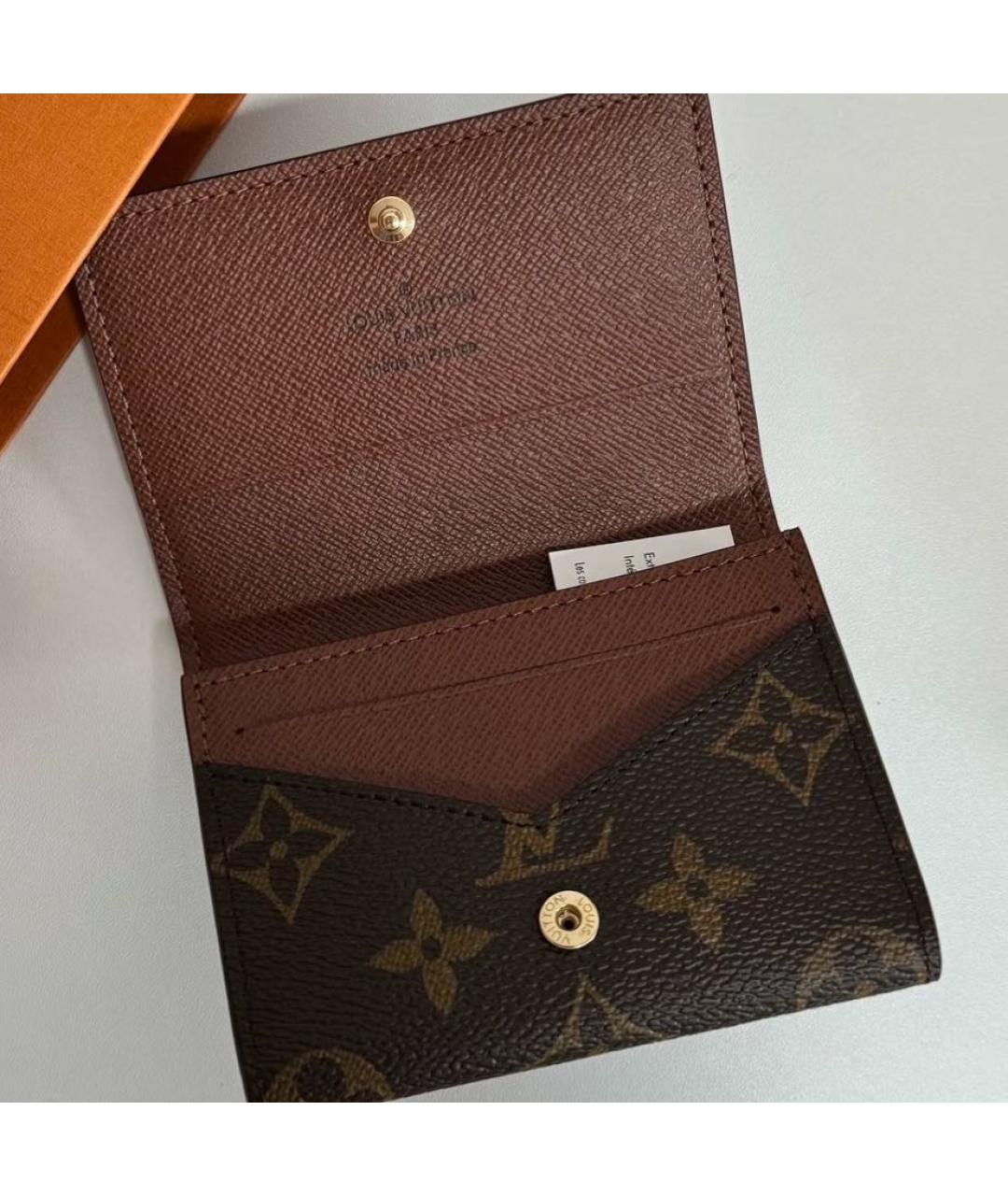 LOUIS VUITTON Коричневый кожаный кошелек, фото 4