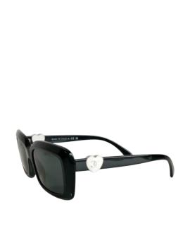 CHANEL Солнцезащитные очки