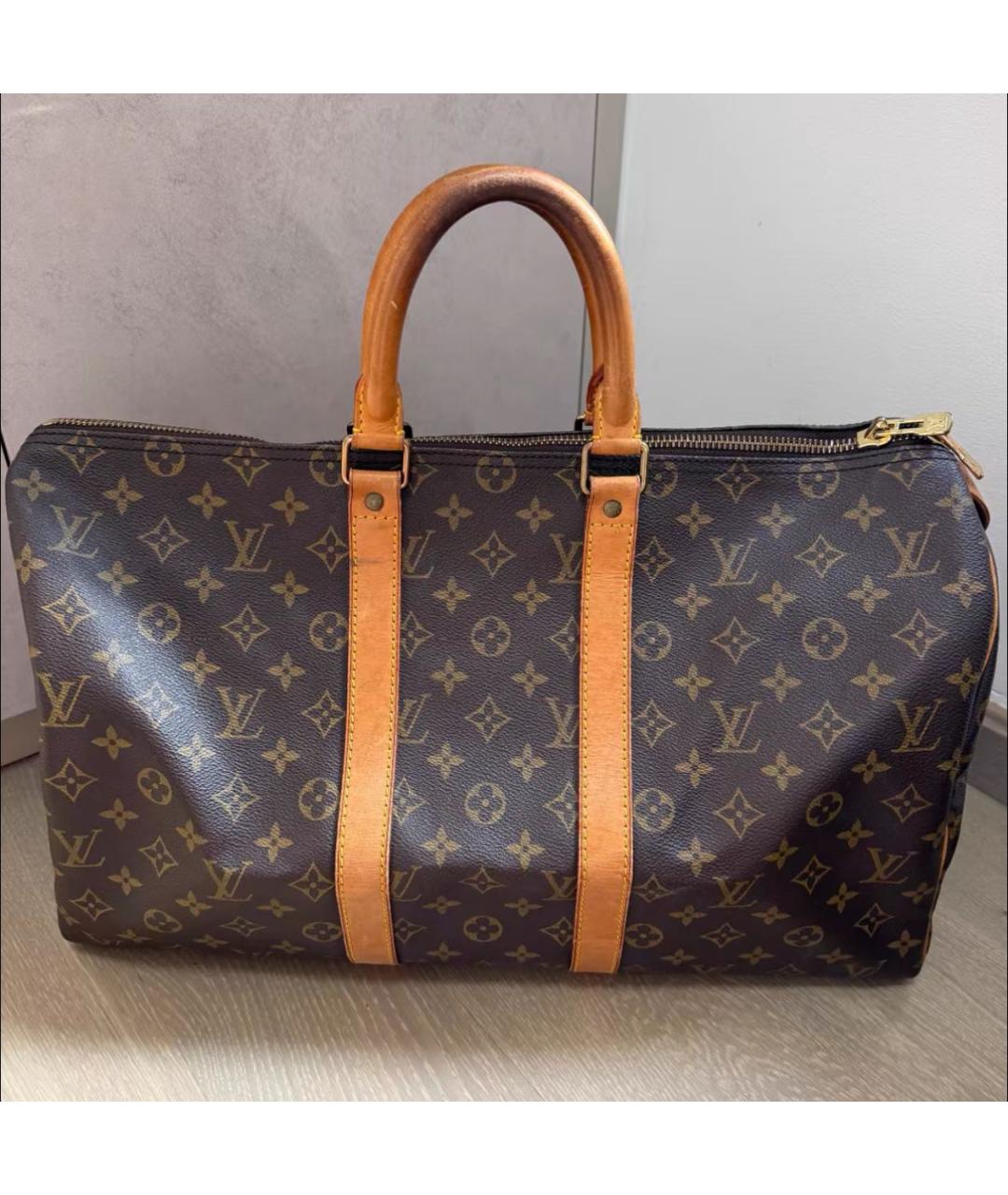 LOUIS VUITTON Коричневая кожаная дорожная/спортивная сумка, фото 4