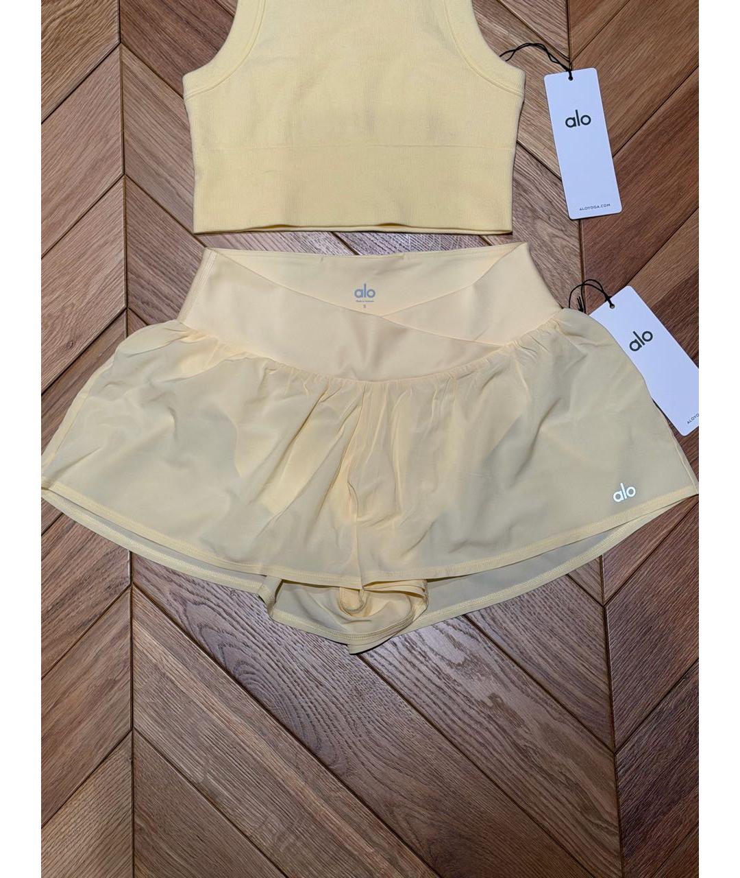 ALO YOGA Желтые полиэстеровые спортивные брюки и шорты, фото 4