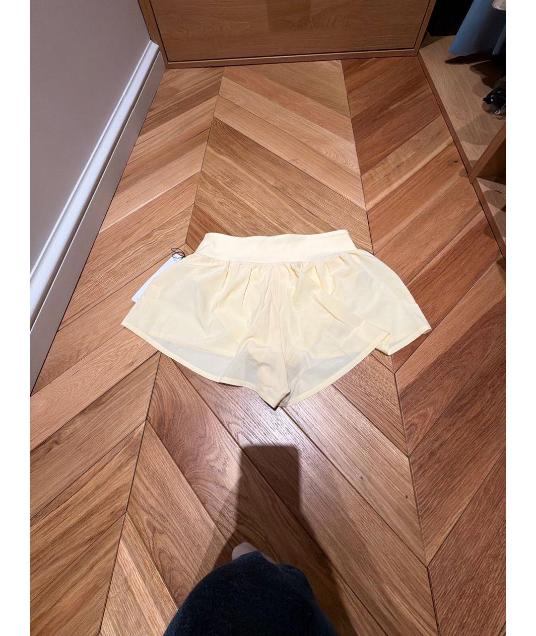 ALO YOGA Желтые полиэстеровые спортивные брюки и шорты, фото 2