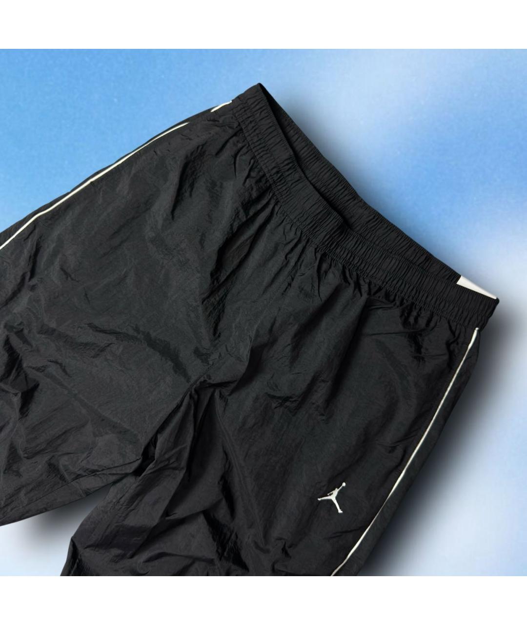 NIKE Черные полиэстеровые повседневные брюки, фото 2