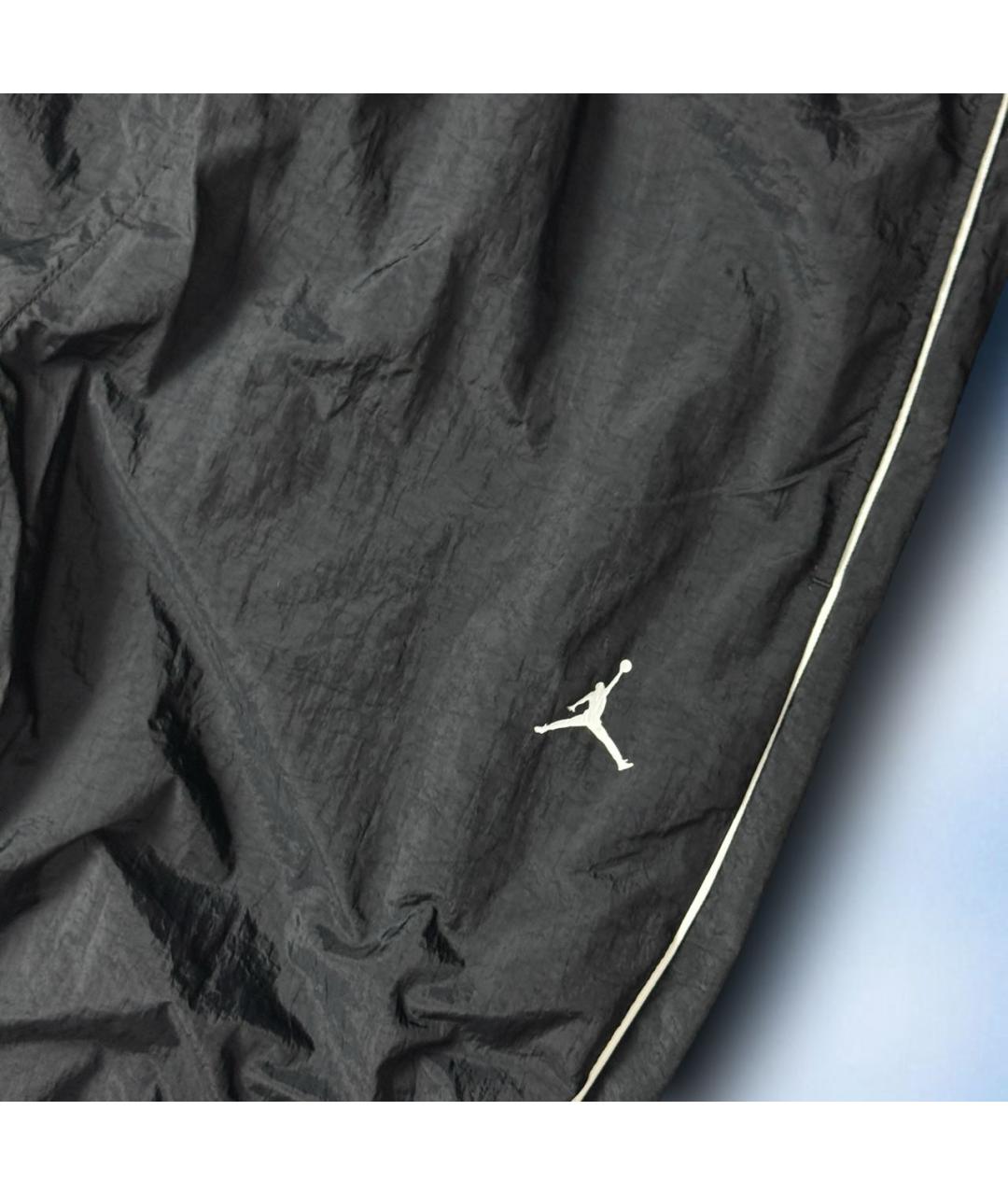 NIKE Черные полиэстеровые повседневные брюки, фото 3