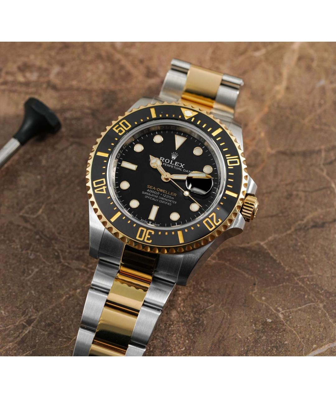 ROLEX Черные часы из желтого золота, фото 2