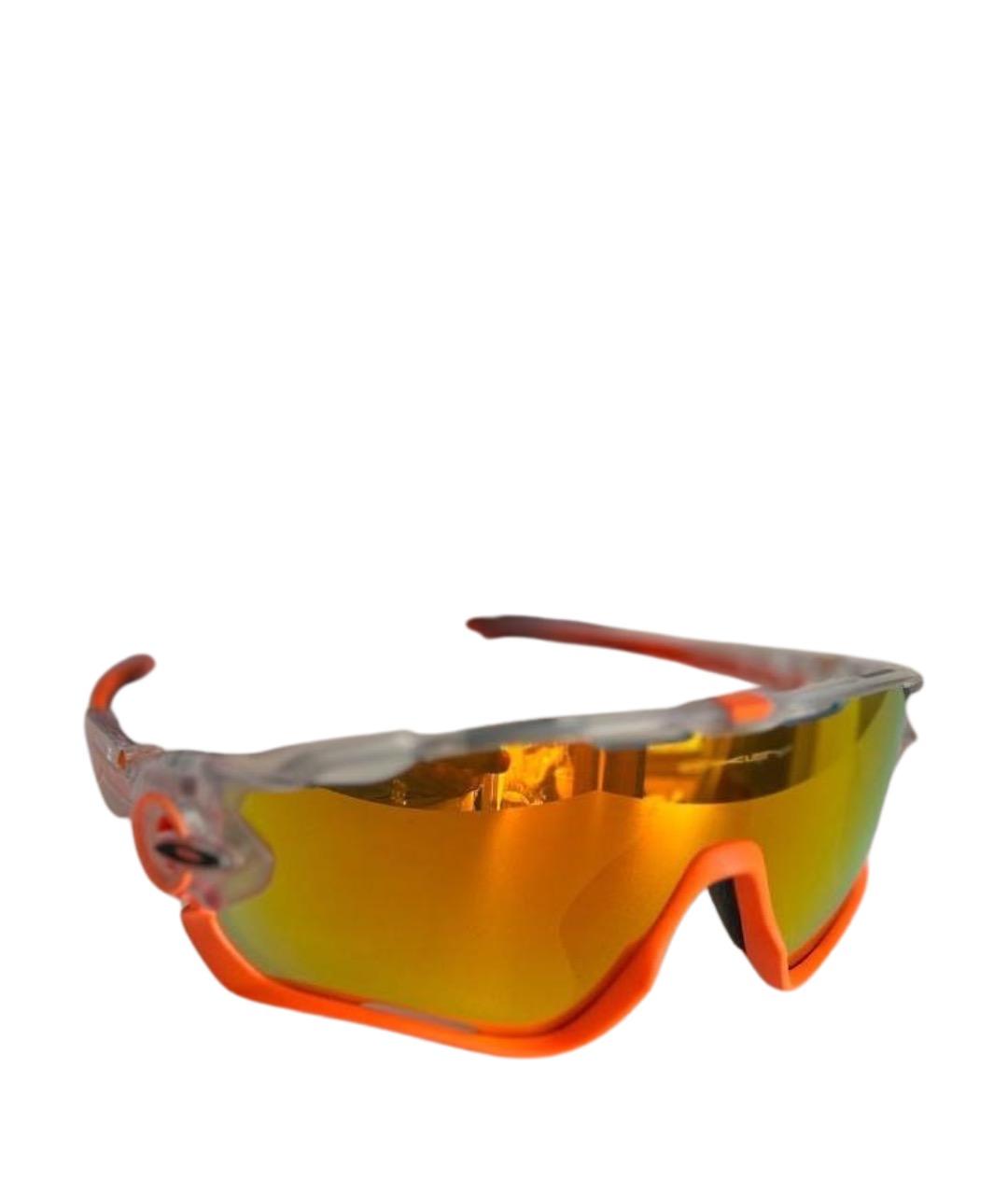 OAKLEY Оранжевое пластиковые солнцезащитные очки, фото 1