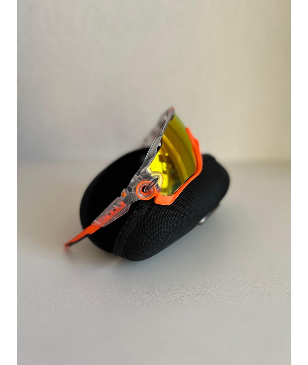 OAKLEY Оранжевое пластиковые солнцезащитные очки, фото 3