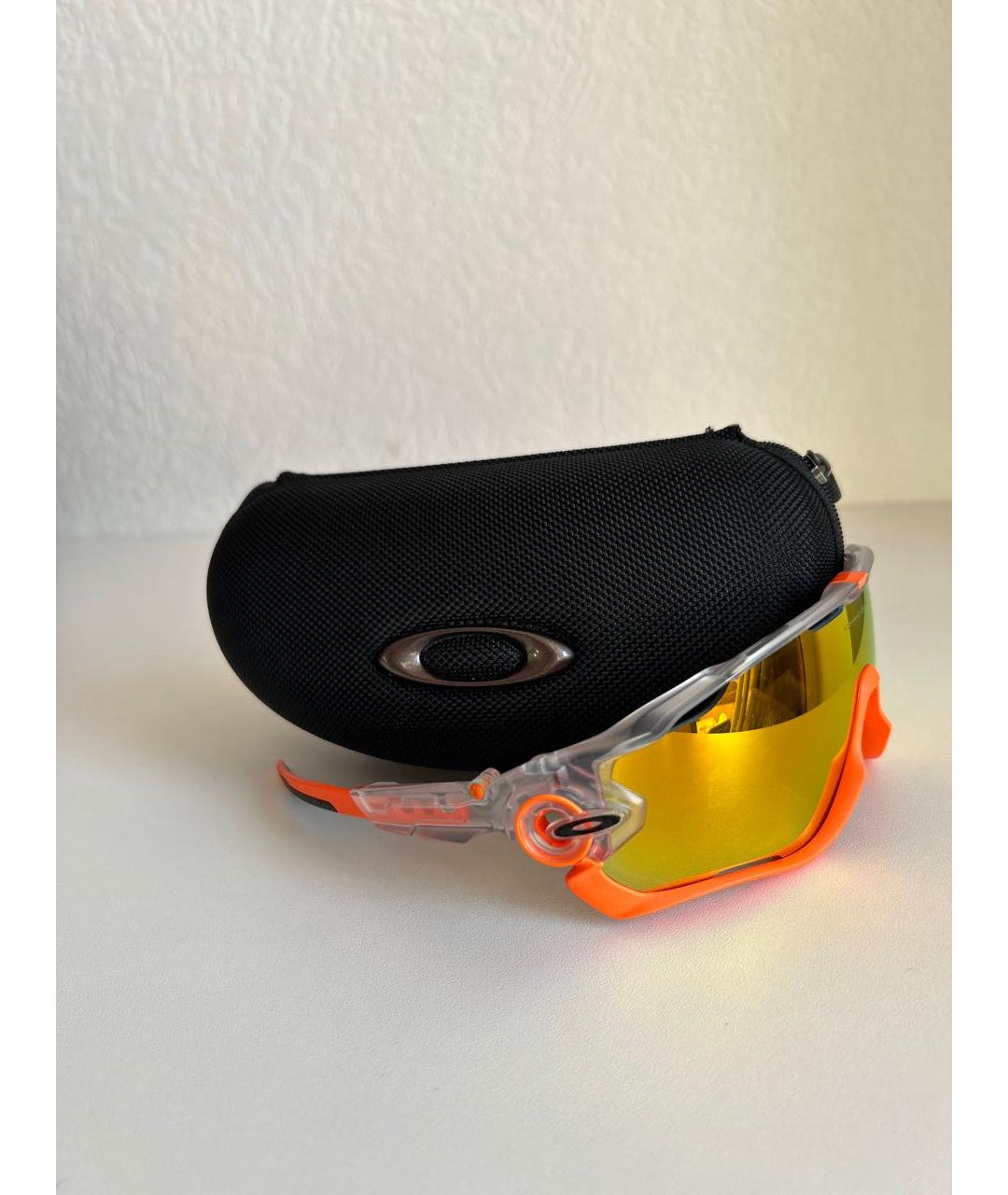 OAKLEY Оранжевое пластиковые солнцезащитные очки, фото 4