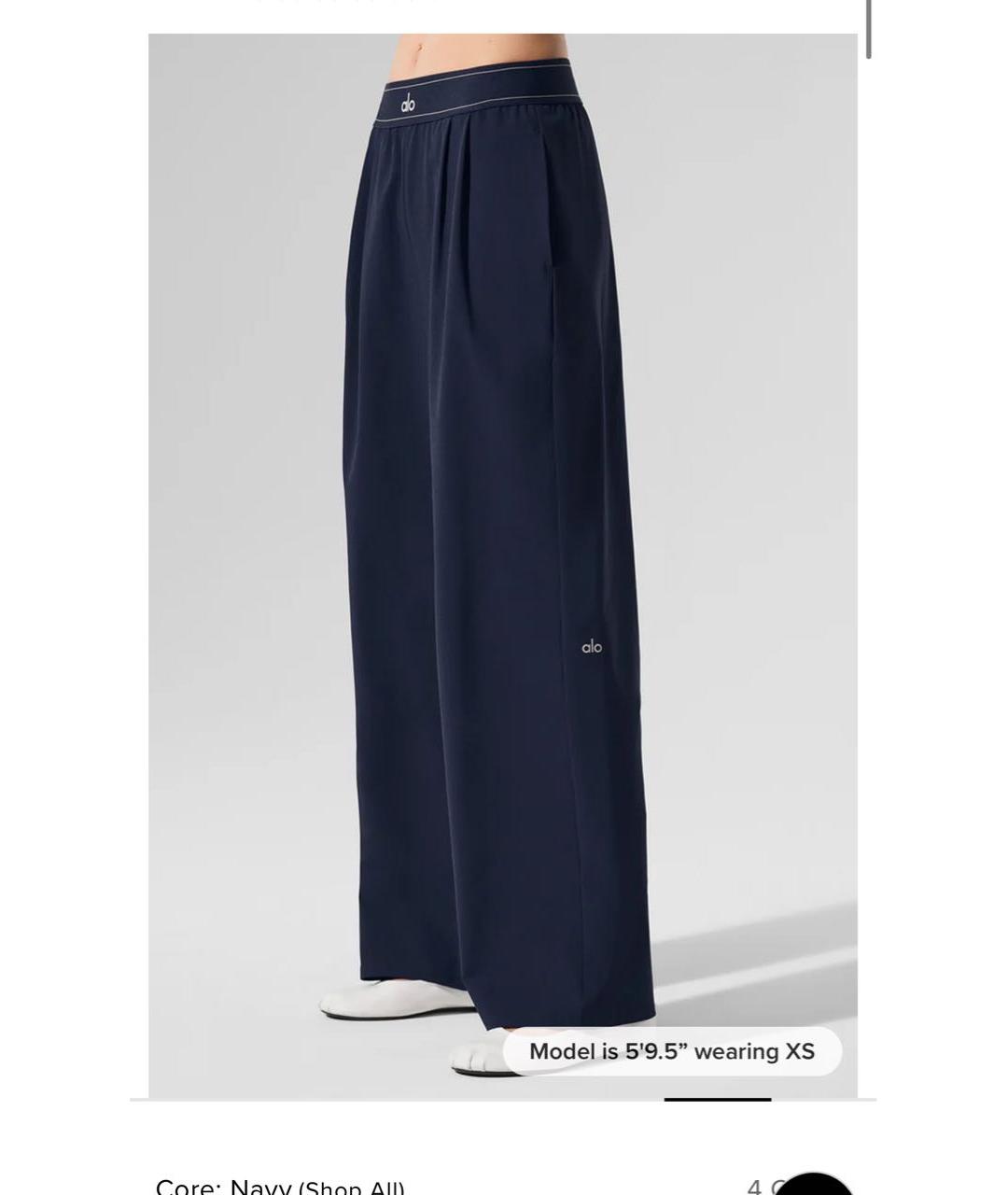 ALO YOGA Темно-синие синтетические брюки широкие, фото 3