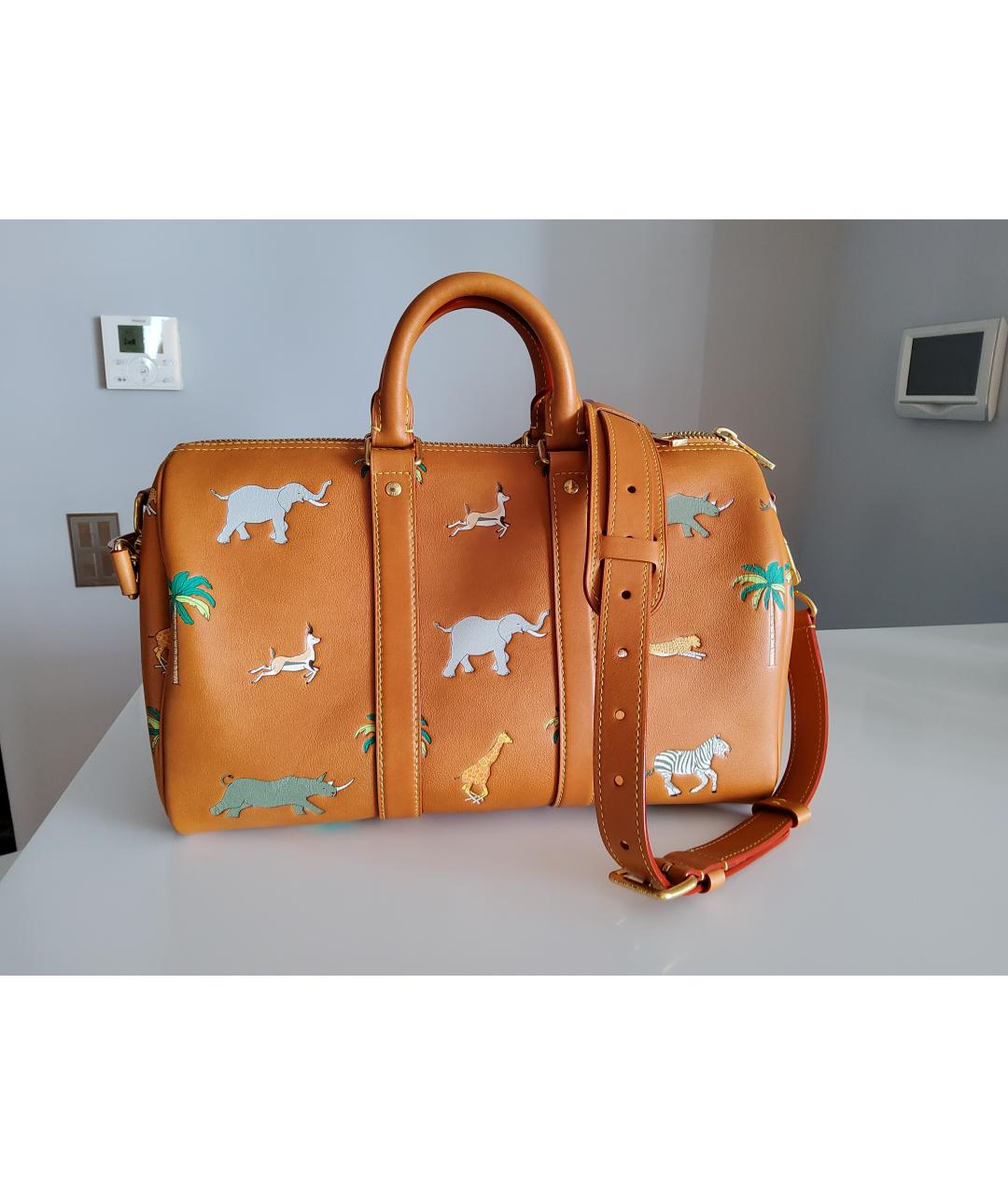 LOUIS VUITTON Оранжевая кожаная дорожная/спортивная сумка, фото 2