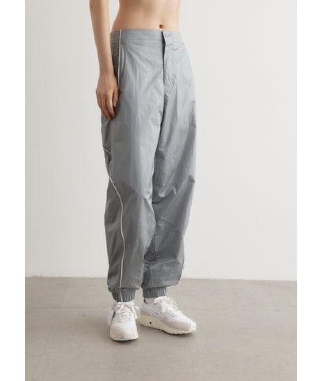 NIKE Серебряные синтетические спортивные брюки и шорты, фото 5