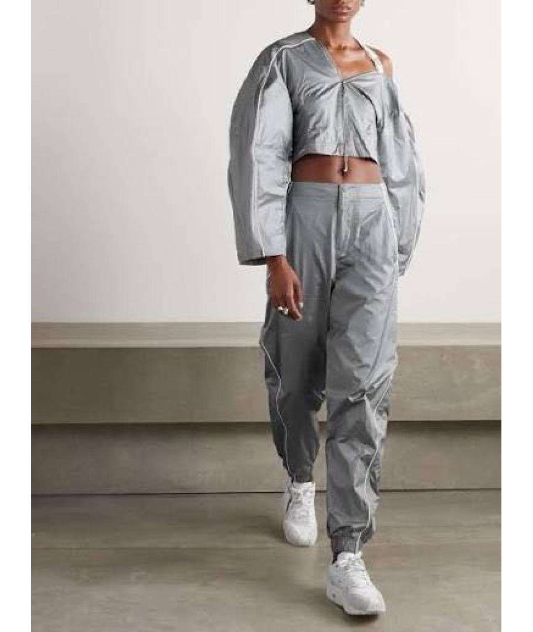 NIKE Серебряные синтетические спортивные брюки и шорты, фото 2