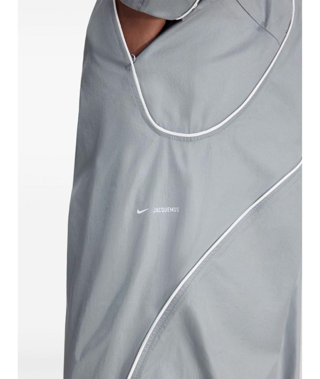 NIKE Серебряные синтетические спортивные брюки и шорты, фото 3