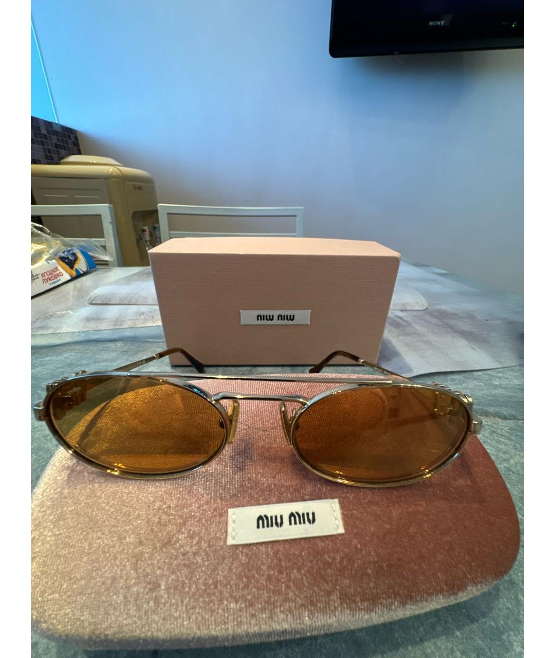MIU MIU Золотые металлические солнцезащитные очки, фото 3