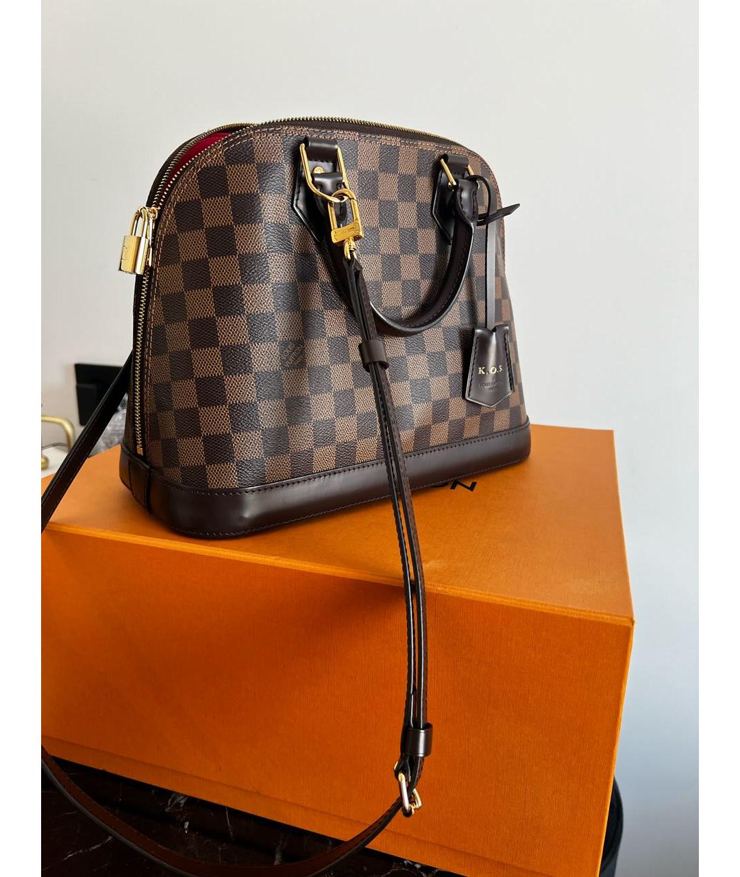 LOUIS VUITTON Коричневая кожаная сумка тоут, фото 9