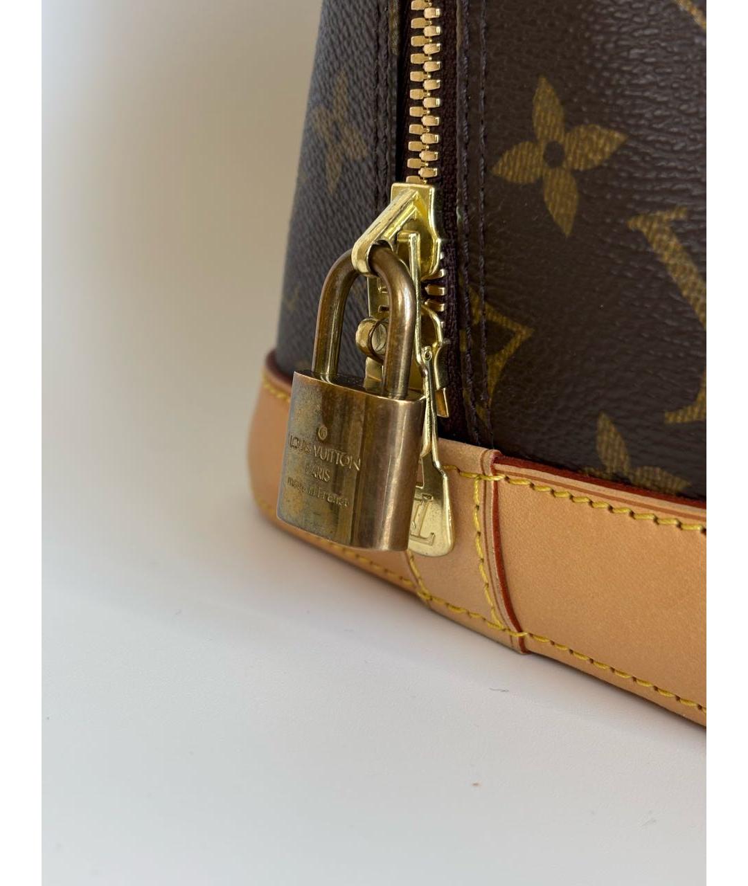 LOUIS VUITTON Коричневая кожаная сумка с короткими ручками, фото 8