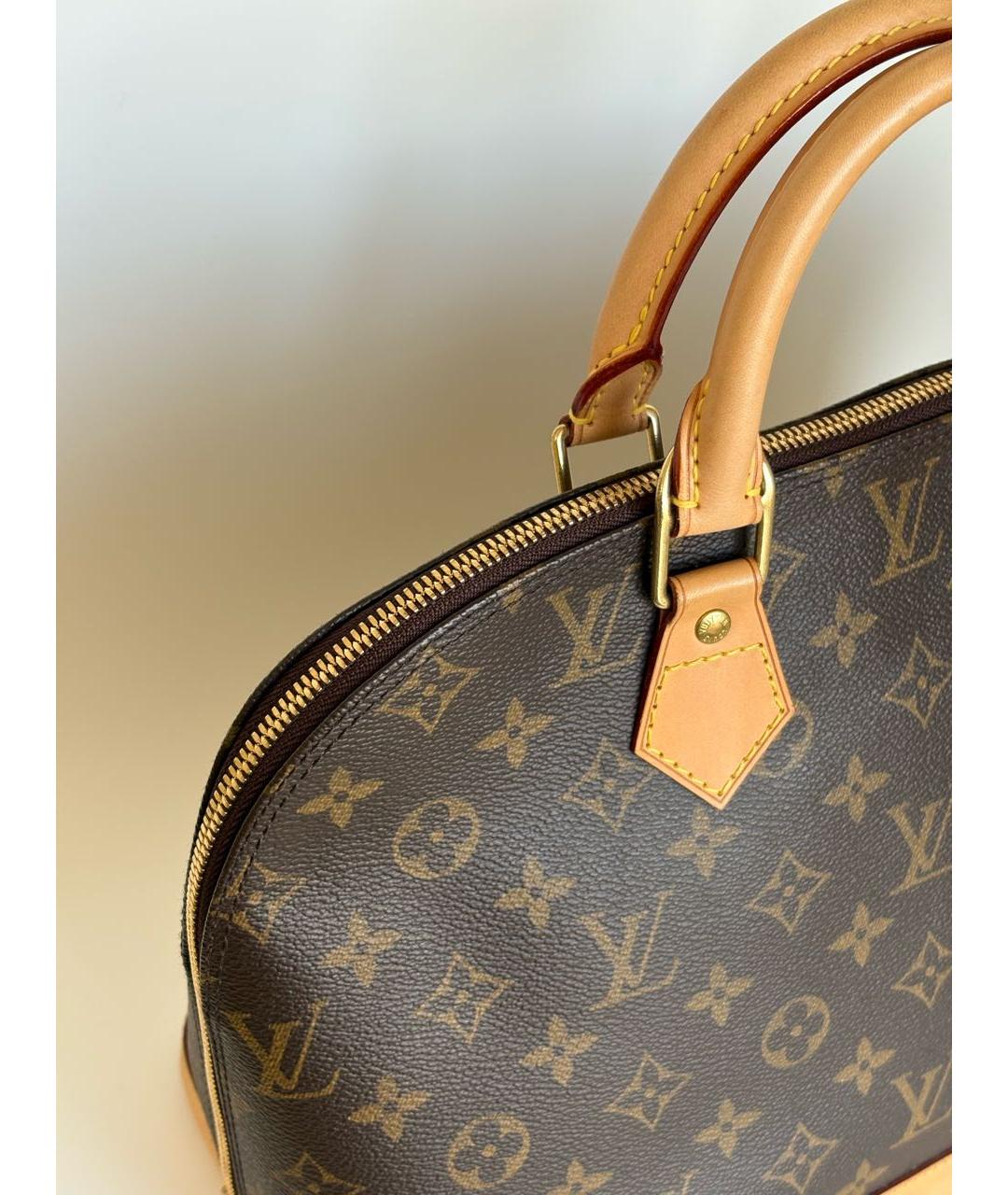 LOUIS VUITTON Коричневая кожаная сумка с короткими ручками, фото 4