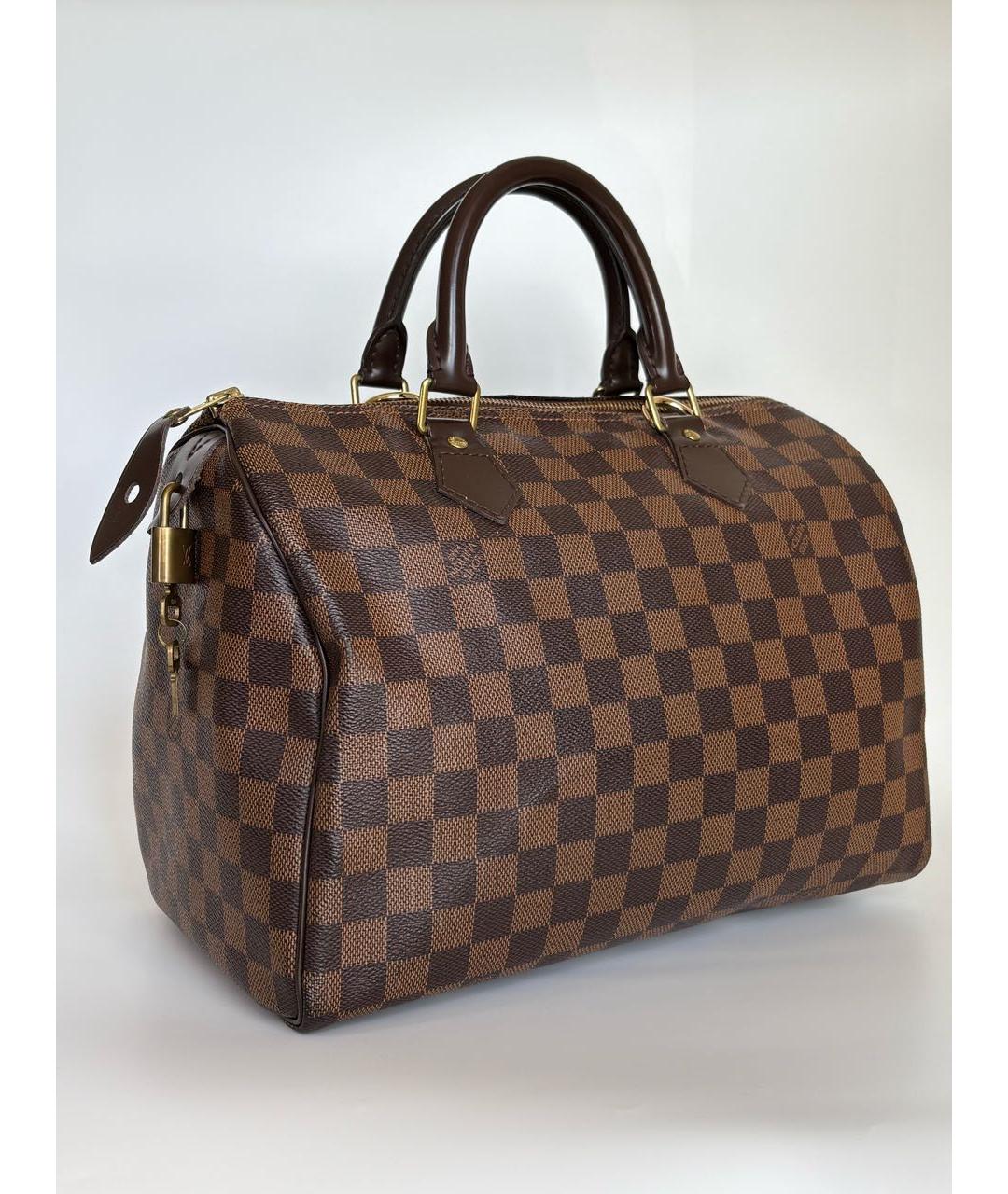 LOUIS VUITTON Коричневая кожаная сумка с короткими ручками, фото 3