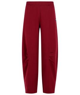 ROTATE Спортивные брюки и шорты