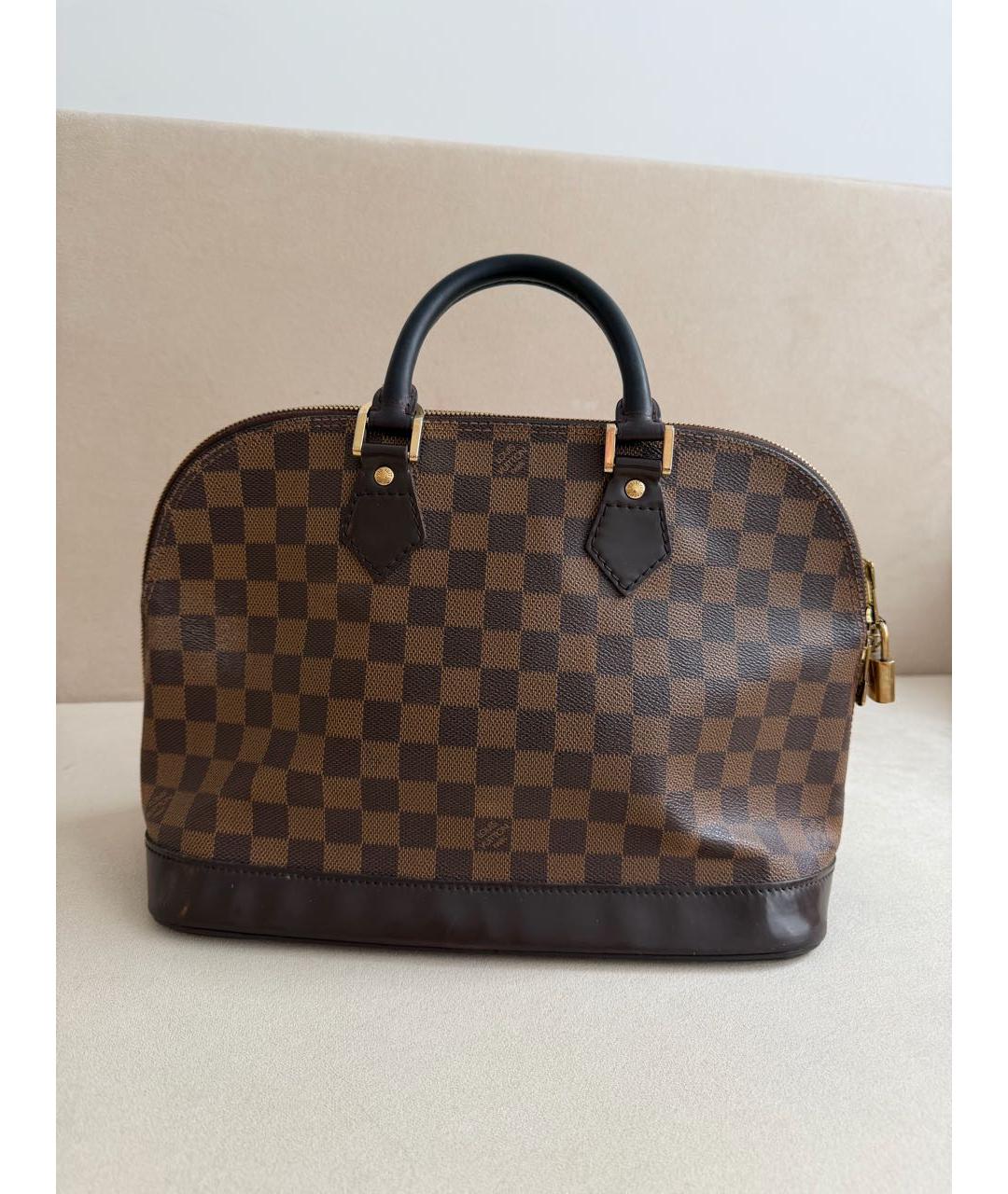 LOUIS VUITTON Коричневая кожаная сумка с короткими ручками, фото 3