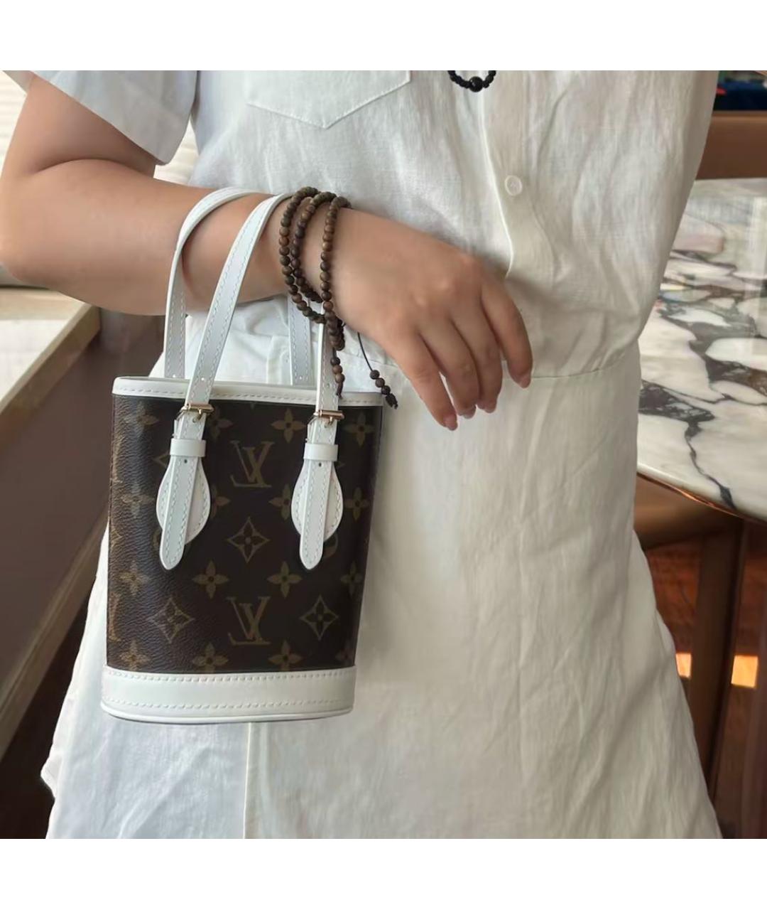 LOUIS VUITTON Коричневая кожаная сумка с короткими ручками, фото 5