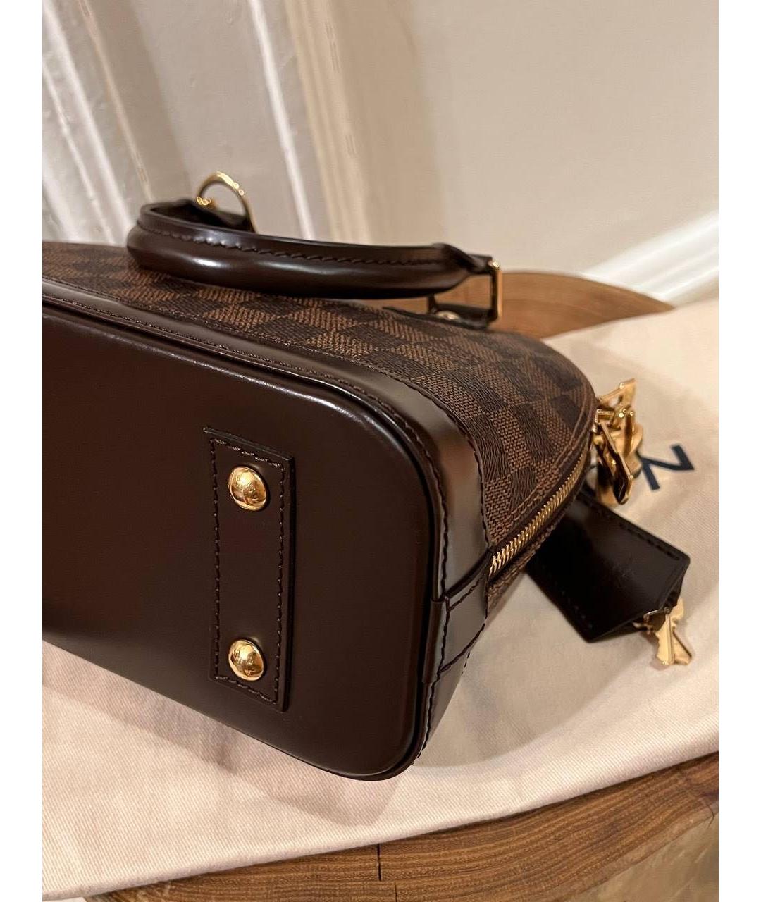 LOUIS VUITTON Коричневая кожаная сумка с короткими ручками, фото 6