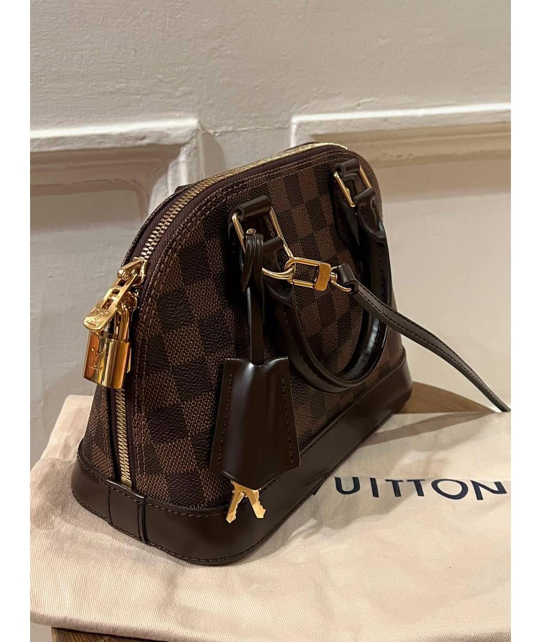 LOUIS VUITTON Коричневая кожаная сумка с короткими ручками, фото 3