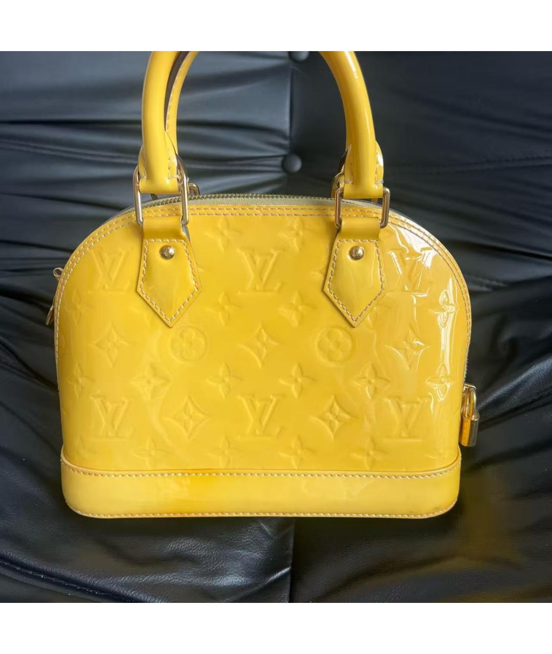 LOUIS VUITTON Желтая кожаная сумка с короткими ручками, фото 3
