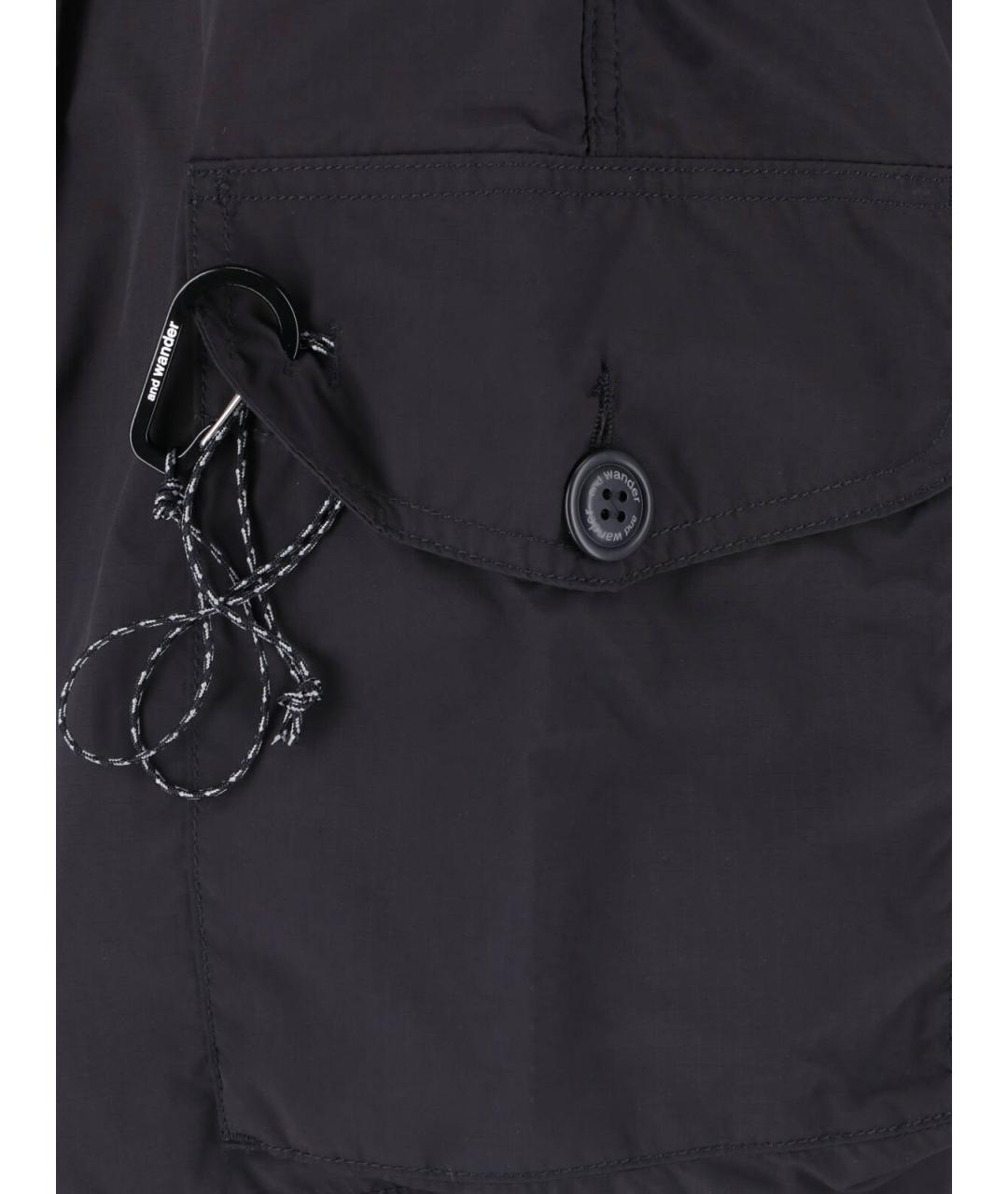 AND WANDER Черные полиэстеровые шорты, фото 4