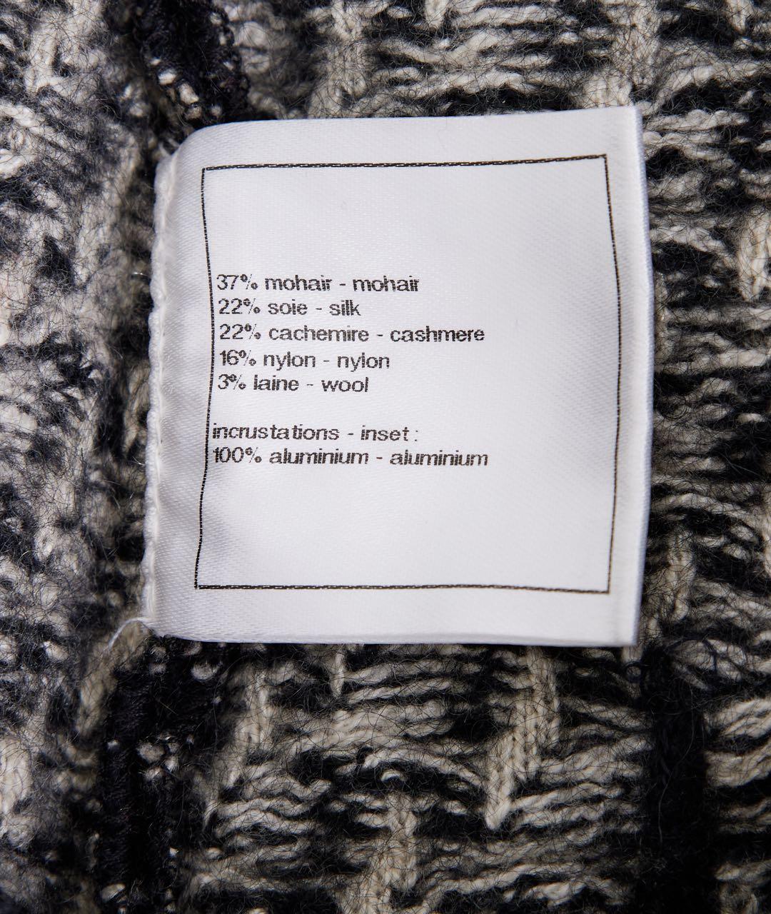 CHANEL Черный шерстяной костюм с юбками, фото 4