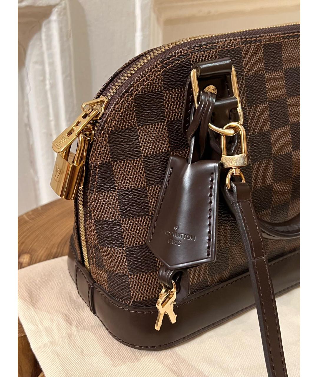 LOUIS VUITTON Коричневая кожаная сумка с короткими ручками, фото 7