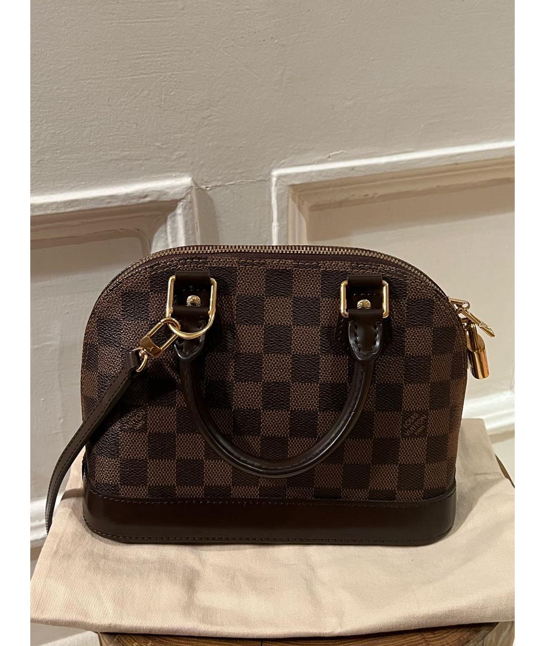 LOUIS VUITTON Коричневая кожаная сумка с короткими ручками, фото 9