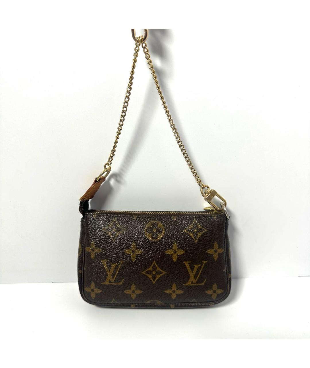 LOUIS VUITTON Коричневая кожаная сумка с короткими ручками, фото 3