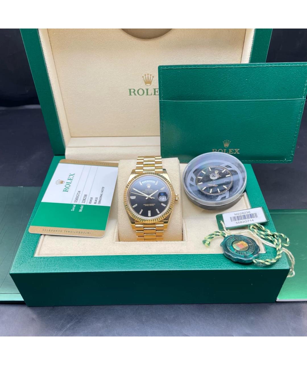 ROLEX Черные часы из желтого золота, фото 2