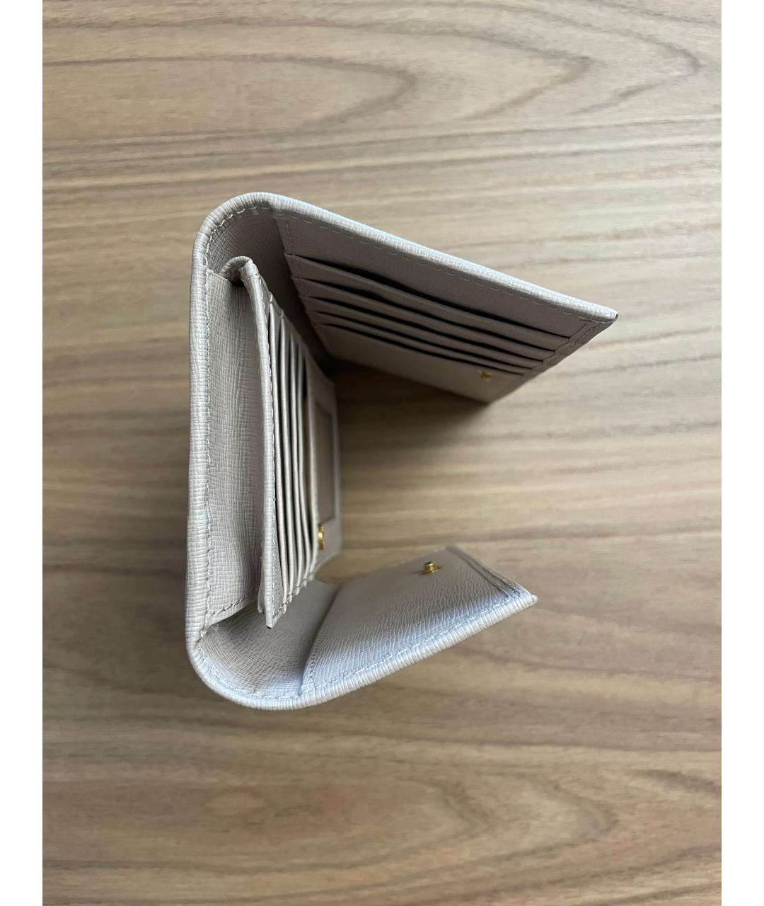 COCCINELLE Бежевый кожаный кошелек, фото 6