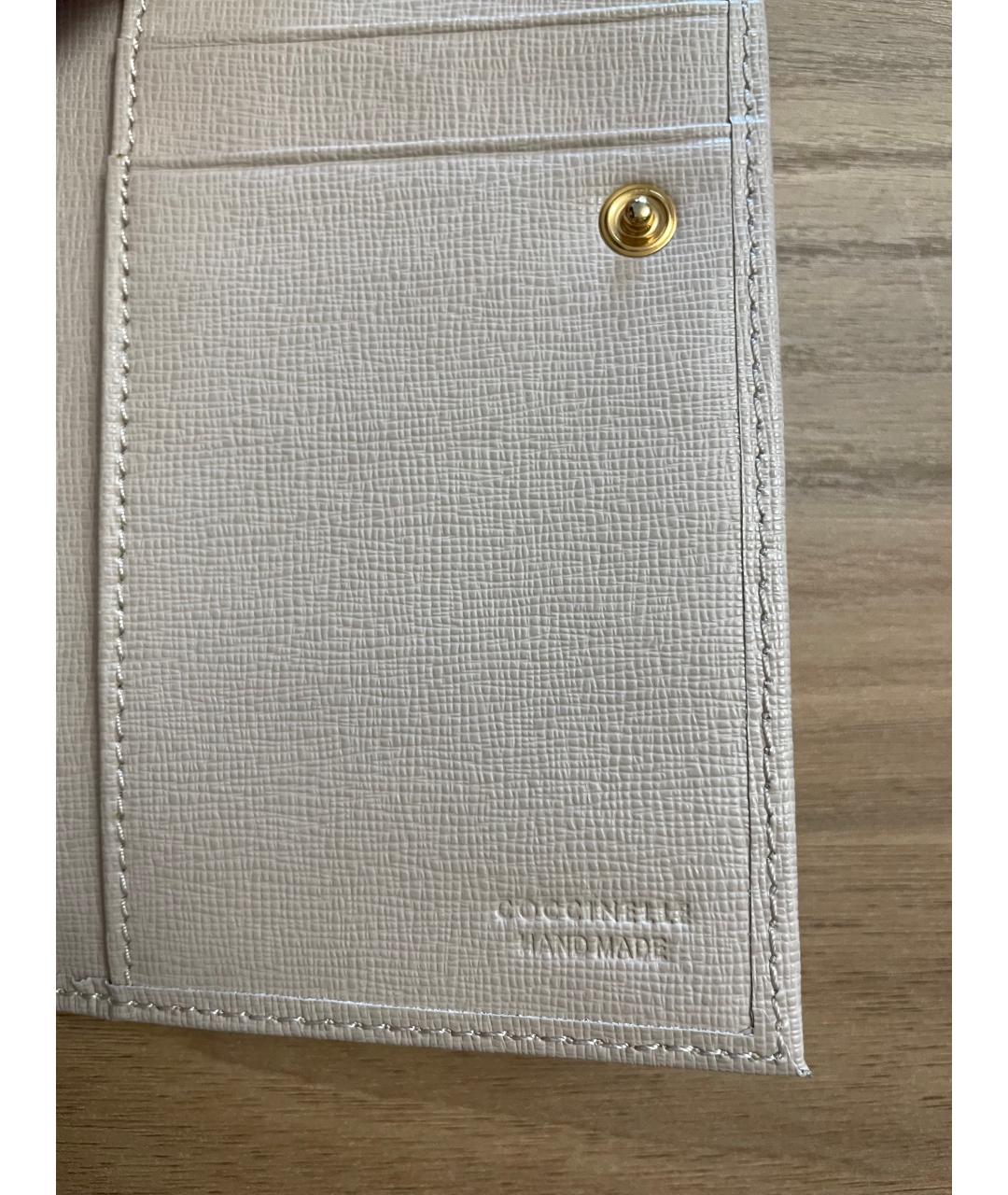 COCCINELLE Бежевый кожаный кошелек, фото 7