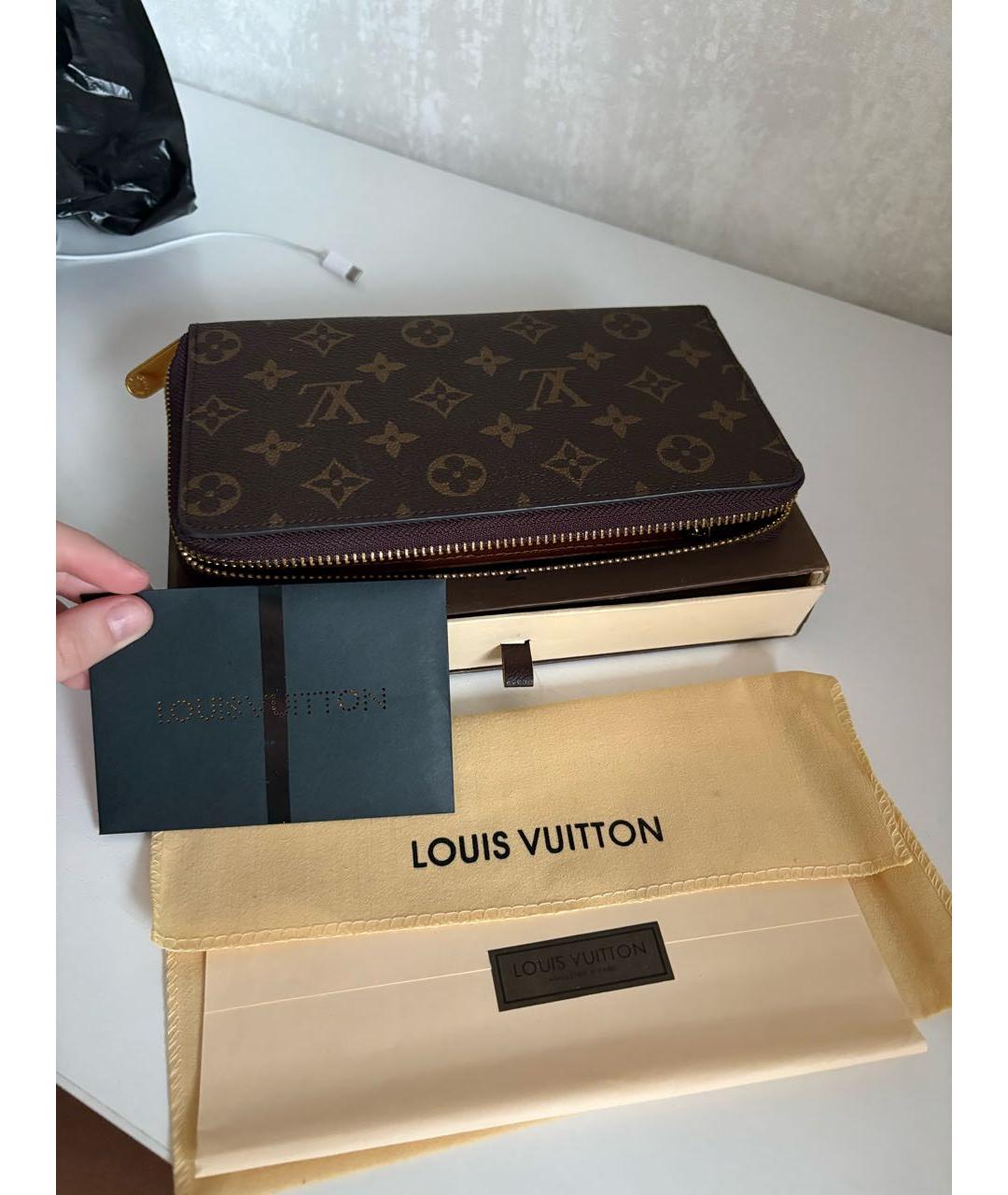 LOUIS VUITTON Коричневый кожаный кошелек, фото 3