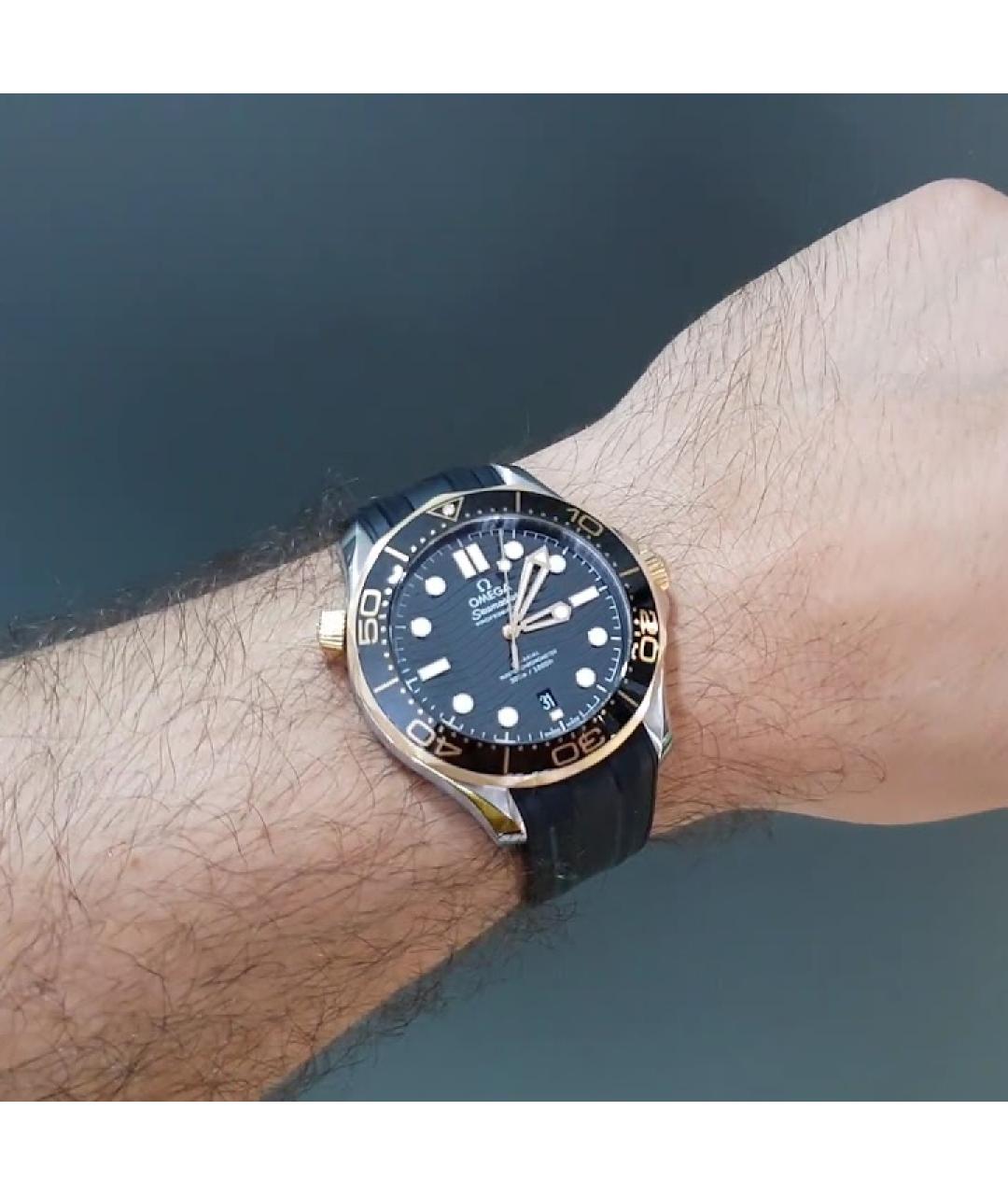 OMEGA Черные часы из желтого золота, фото 2