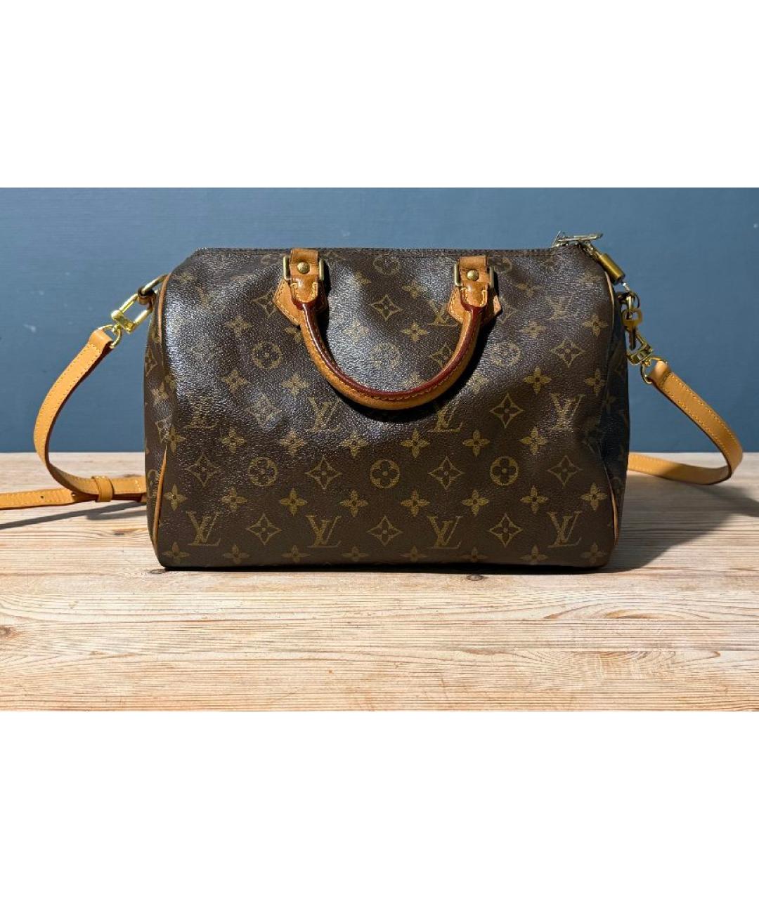 LOUIS VUITTON Коричневая кожаная сумка с короткими ручками, фото 5